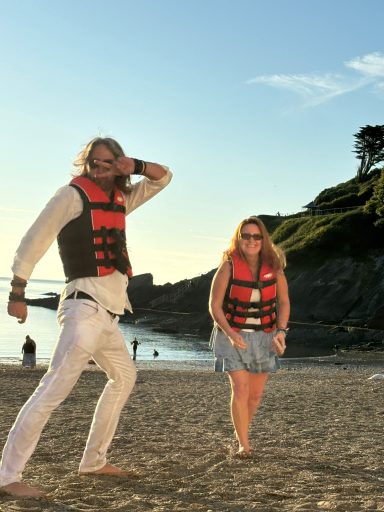 Neurodiverse couple having fun on a beach